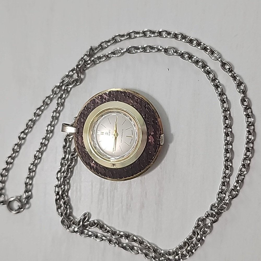 Mawi aries pendant watch.